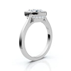 Side profile of a white gold 4 carat heart lab diamond engagement ring showing cathedral shoulders and hidden halo.