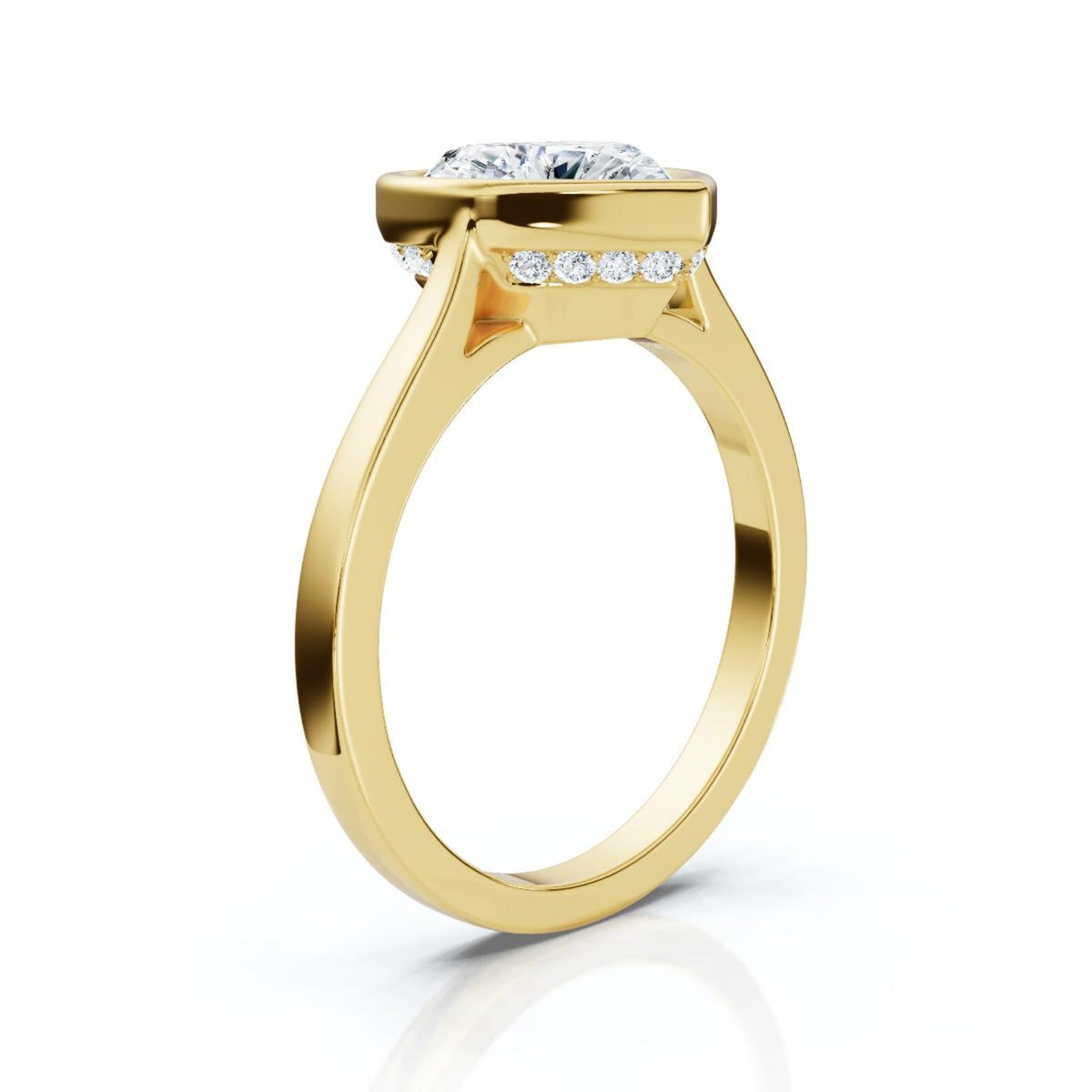 Angled profile view showing the sleek yellow gold band, cathedral lift, and hidden diamond halo setting.