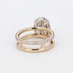 Angled rear profile view displaying the connected dual band structure and open hidden halo basket of a 4 CT oval lab diamond ring.