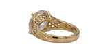 Side undergallery perspective showing high-polish yellow gold band transitioning to hand-engraved floral motifs.