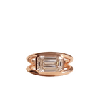 Frontal face-up view of a 3 CT East-West emerald cut lab grown diamond set in a modern rose gold bezel double band ring.