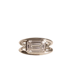 Direct view of a white gold modern engagement ring featuring a 3 carat horizontal emerald cut lab diamond in a sleek bezel frame.