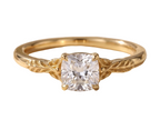 Direct face-up view of a 2 CT cushion cut lab grown diamond solitaire ring featuring sculpted botanical leaf shoulders in yellow gold.