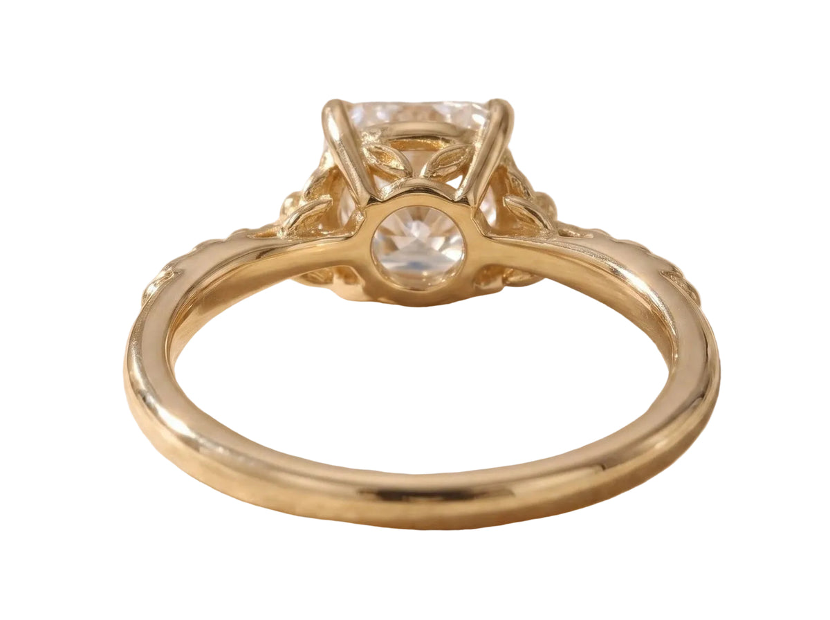 Undergallery side profile view of a yellow gold 2 CT cushion lab diamond ring showing the openwork basket structure.