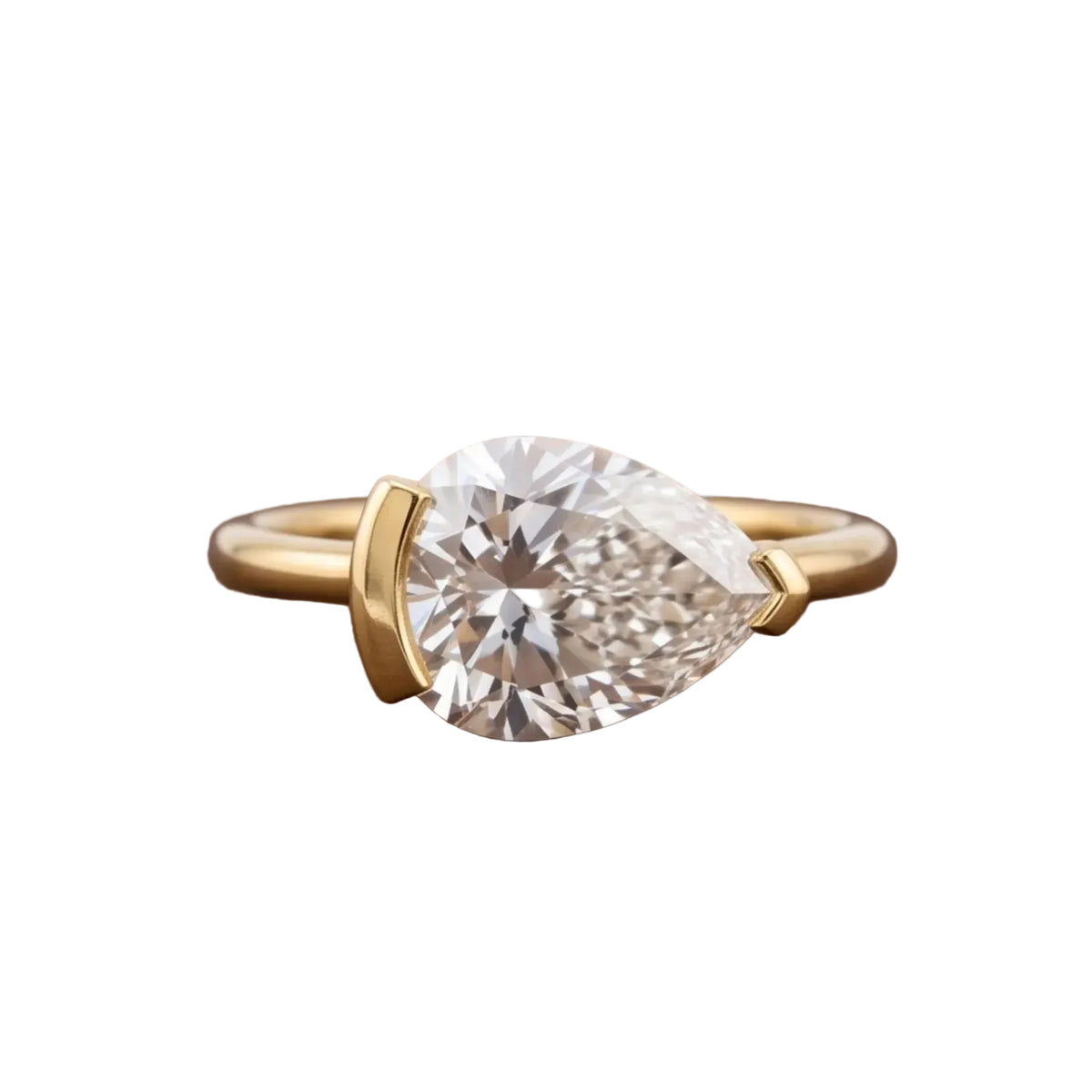 Studio top-down view of a 2 carat East-West pear cut lab grown diamond in a sleek half-bezel setting.
