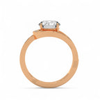 Side perspective of a 3 CT round cut lab grown diamond ring with a curved split pavé band in rose gold.