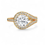 Top-down view of a 3 CT round lab diamond set inside a teardrop bypass halo in yellow gold.