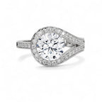 Face-up top view showing white gold teardrop bypass halo holding a 3 CT round brilliant lab diamond.
