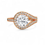 Top-down view of a 3 carat round lab grown diamond surrounded by a rose gold teardrop halo.