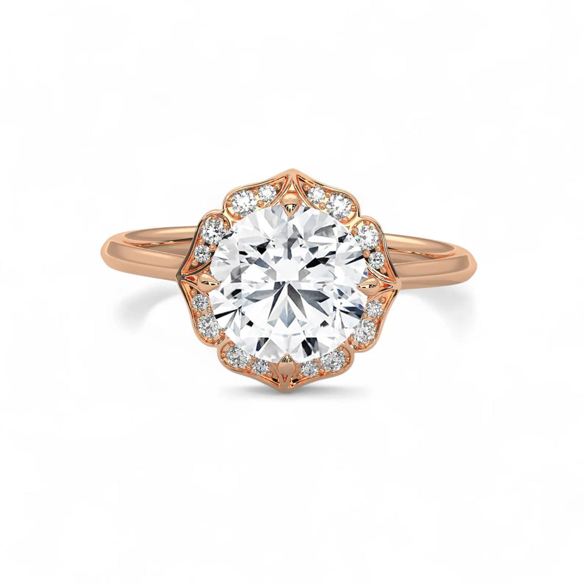 Top view of a 3 carat round lab grown diamond surrounded by a rose gold scalloped floral halo.