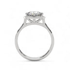 Direct side profile view of a white gold round lab diamond engagement ring with cathedral floral setting.
