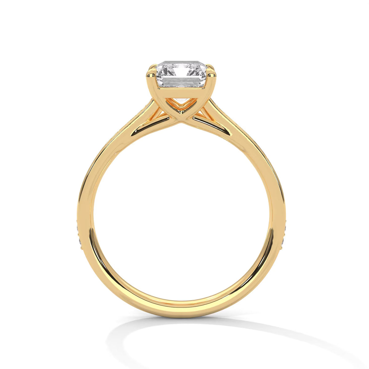 Direct side profile view of a yellow gold 4 CT emerald cut lab grown diamond engagement ring with open cathedral basket setting.
