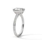 Side profile perspective of a white gold 4 CT emerald cut lab grown diamond ring with diamond-encrusted band.