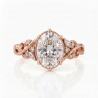 Direct front view of a 3 CT oval cut lab grown diamond engagement ring in rose gold with vintage filigree vine band and milgrain detail.