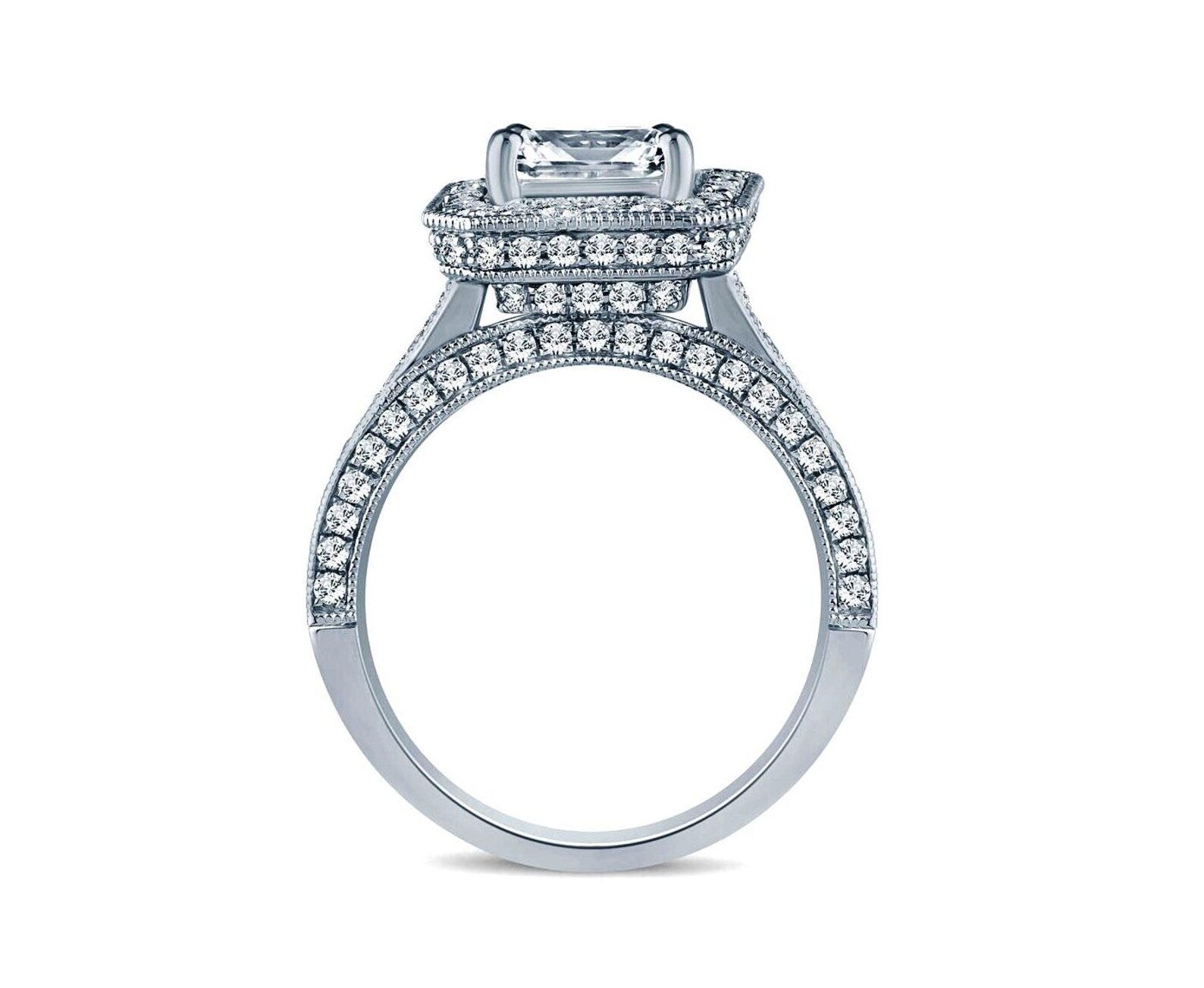 Direct side profile of a radiant cut diamond halo ring showcasing the elevated architectural setting, hidden halo collar, and diamond-encrusted split shank band.