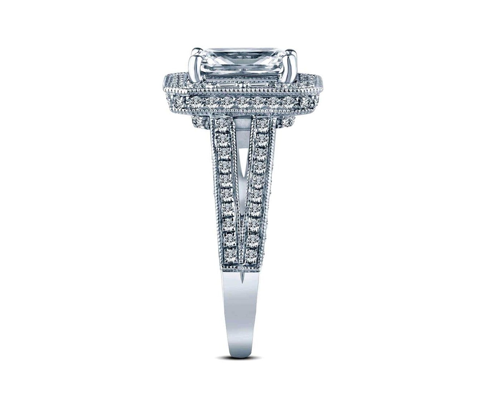 Angled side profile view highlighting the deep, diamond-accented split shank and sturdy structural design of a white gold radiant cut engagement ring.