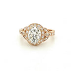 Front view of a 3 CT oval cut lab grown diamond featuring a rose gold halo setting and marquise side accents