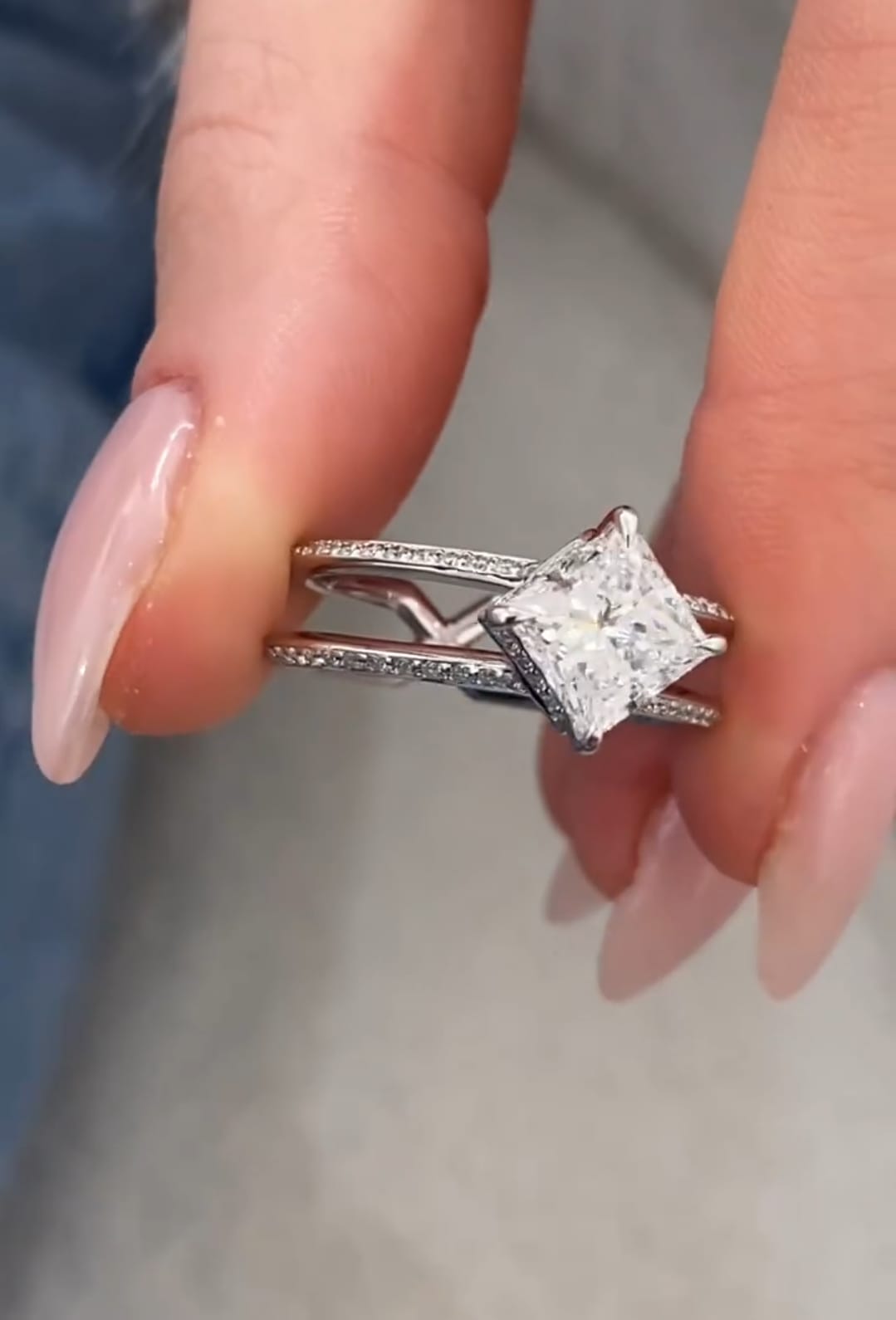 Side view showing the criss-cross split band detail and 2 carat princess cut lab diamond center stone