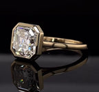 Angled view showcasing the octagonal bezel frame and brilliance of the 4 CT Asscher cut lab diamond