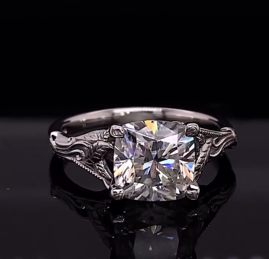Front angle reflection view showcasing the brilliant facets of a 3 CT cushion cut lab diamond