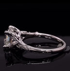 Profile view displaying the under-gallery craftsmanship and white gold band of the leaf filigree ring