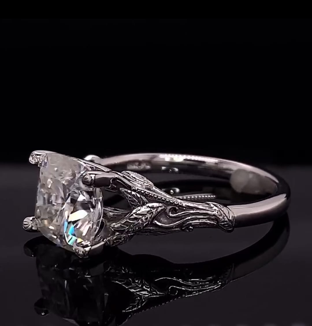 Angled side profile showing the vine-wrapped prongs and brilliance of the 3 CT cushion lab diamond
