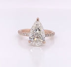 Direct top view showcasing a brilliant 4 carat pear cut lab grown diamond in rose gold