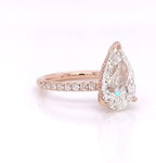 Three-quarter angle view emphasizing the sparkle and clarity of a 4 CT pear lab diamond
