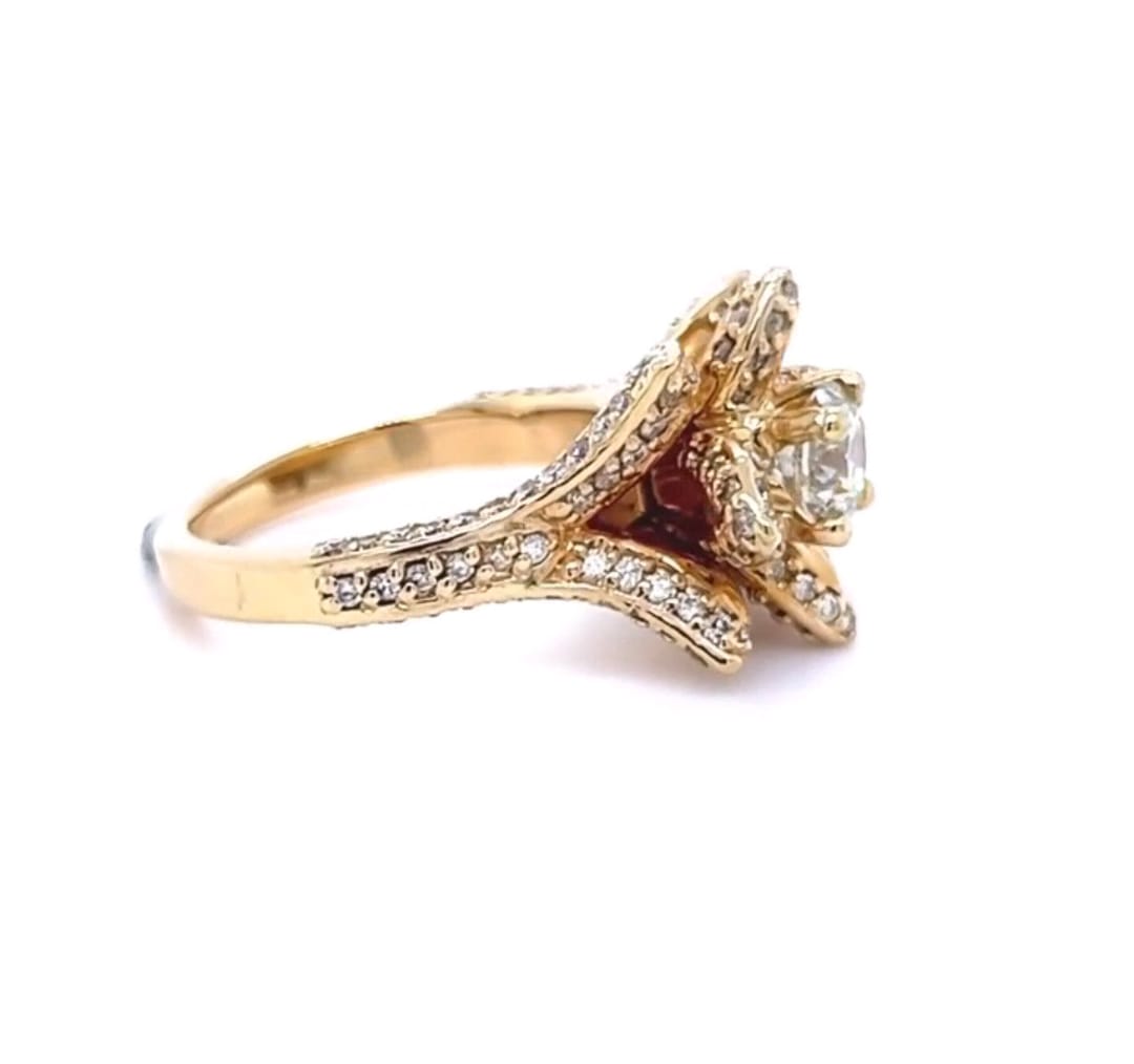 Side profile view highlighting the tiered lotus flower structure and pavé split shank in yellow gold