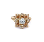 Top view showing the 1.5 CT round center diamond framed by layered pavé diamond lotus petals