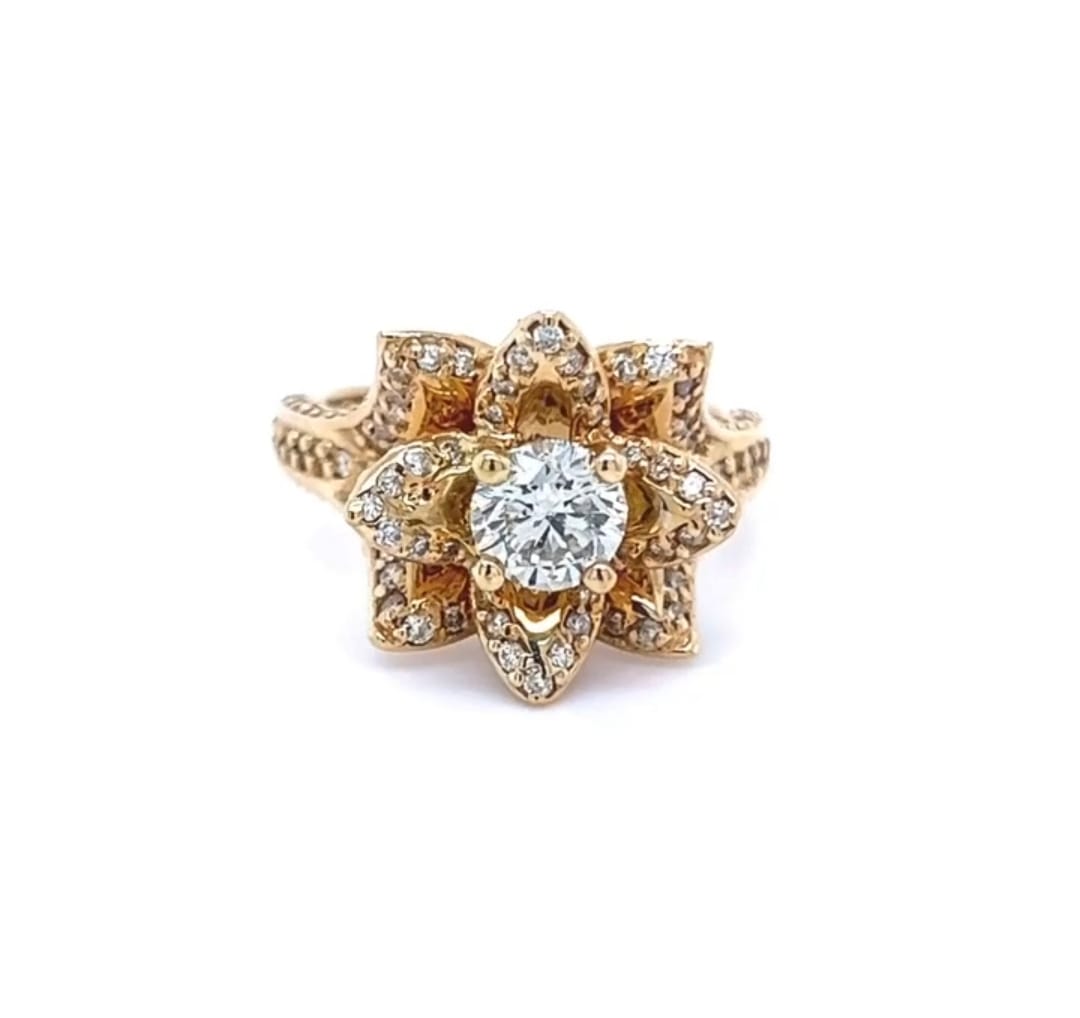 Top view showing the 1.5 CT round center diamond framed by layered pavé diamond lotus petals
