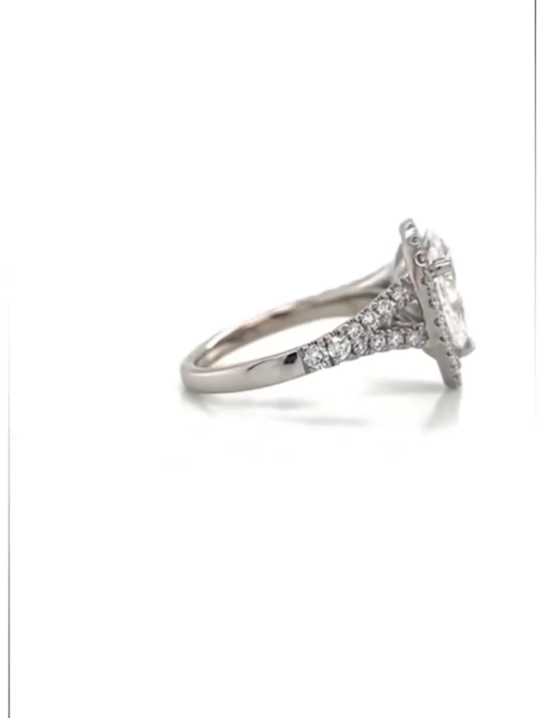 Reverse side view emphasizing the polished white gold band and micropavé split-shank detail