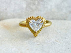 Direct top view showcasing a brilliant 2 CT heart shape lab grown diamond in a granulated beaded halo frame