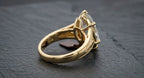 Rear profile view showing the yellow gold openwork under-gallery basket of a 3 CT marquise diamond ring