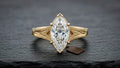 Front view showcasing the brilliance and symmetry of a 3 CT marquise cut lab grown diamond in yellow gold