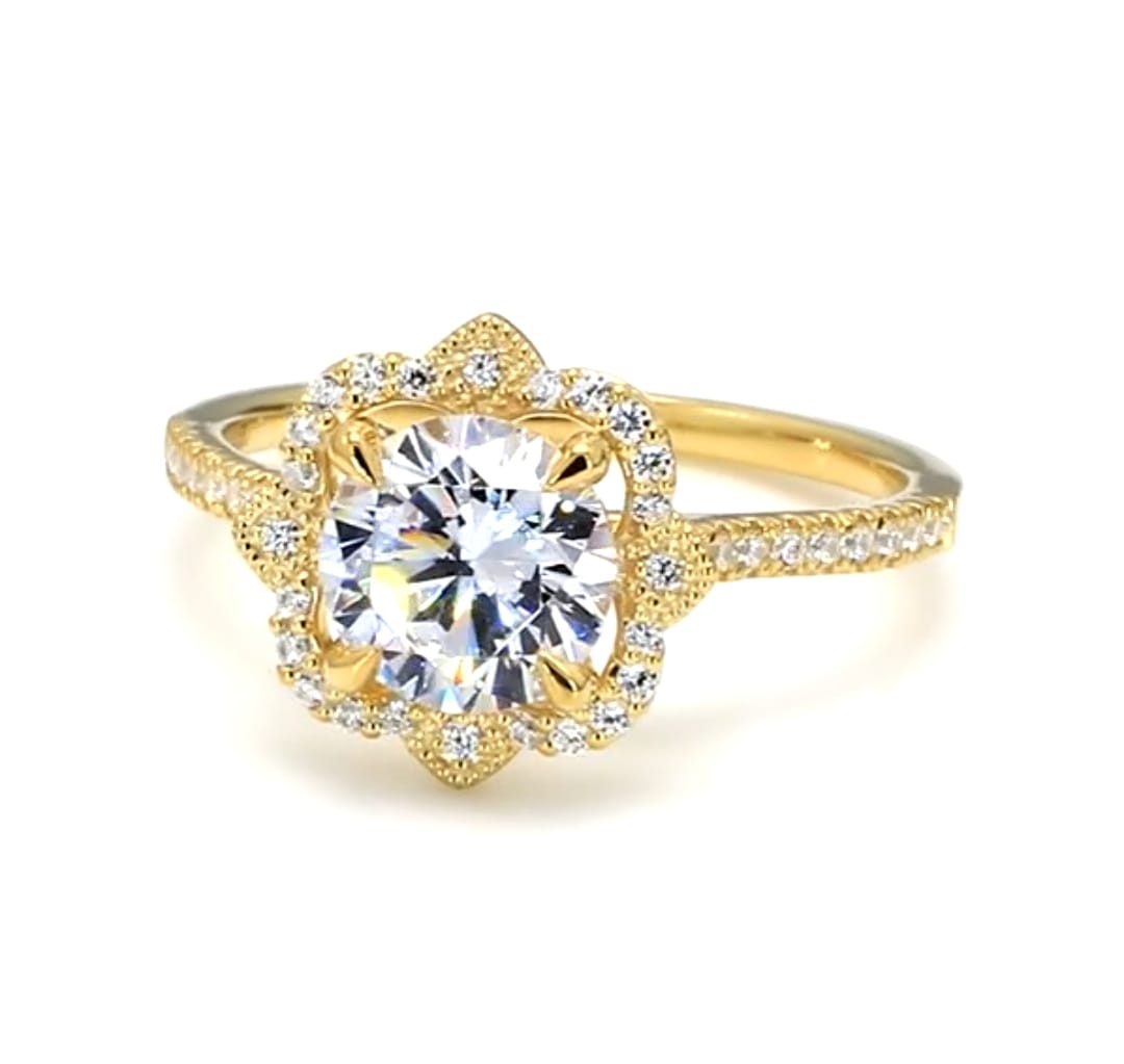 Top front view of a 3 CT round cut lab grown diamond engagement ring with vintage floral halo and pave band.