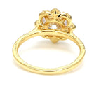 Bottom view of yellow gold band showing the open flower basket gallery under the center diamond.