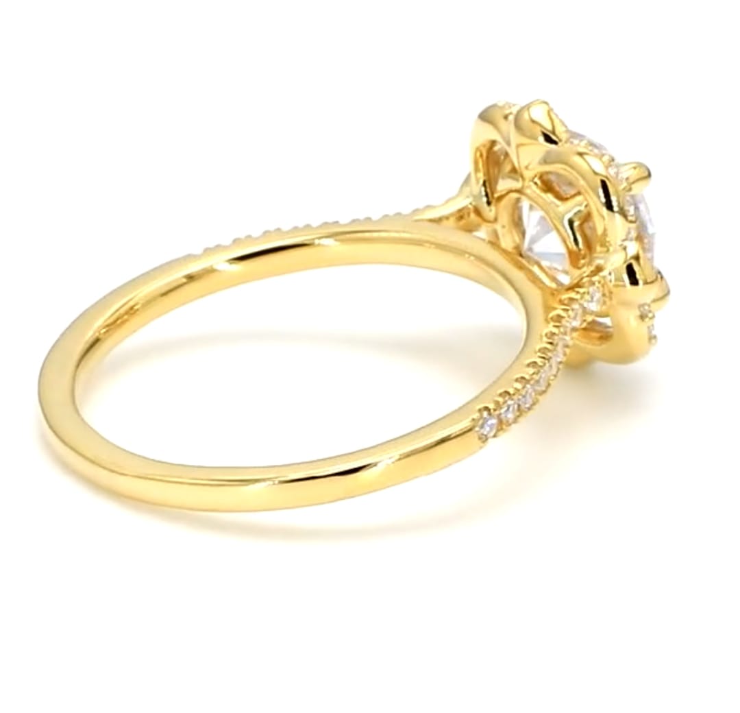 Under-gallery view showing the floral basket detail and polished inside band of the lab diamond ring.