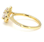 Close-up side profile showing pave-set accent diamonds along the yellow gold ring band.