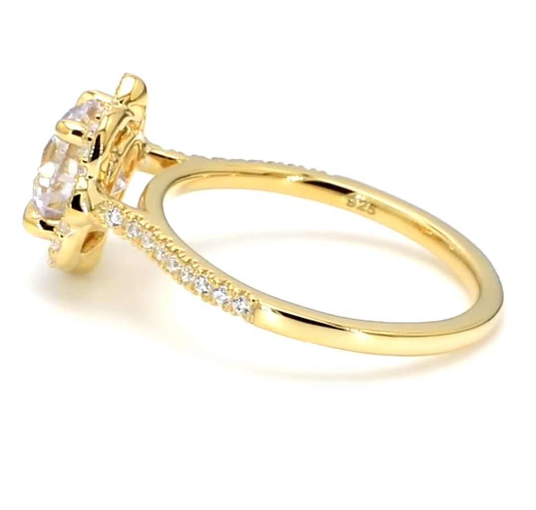 Close-up side profile showing pave-set accent diamonds along the yellow gold ring band.