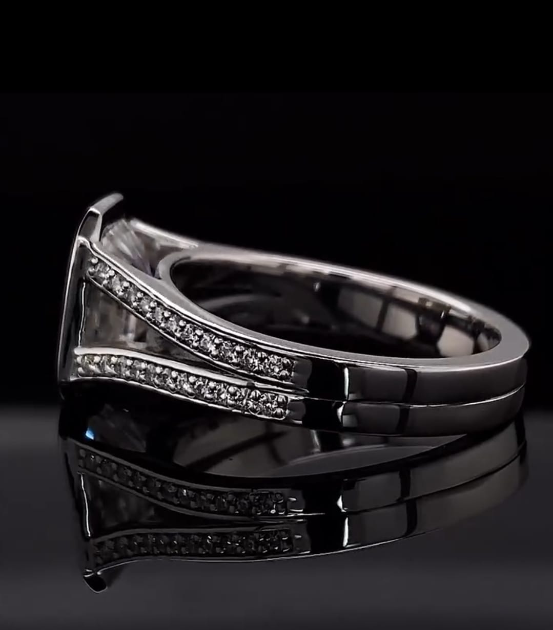 Rear perspective view showcasing the polished interior band and split pave architecture of the engagement ring.