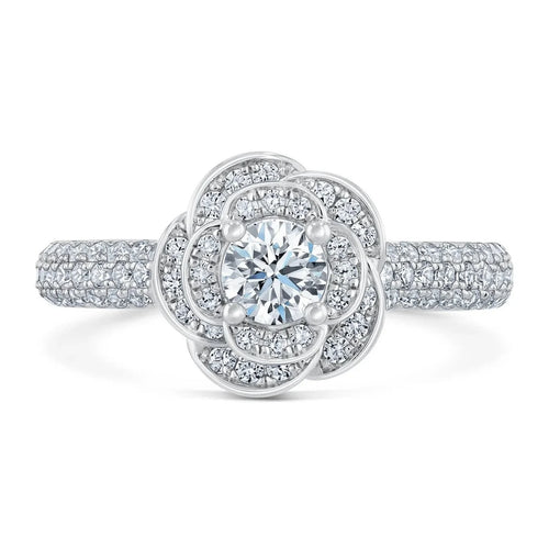 Top-down view highlighting 1.5 CT round cut lab grown diamond set inside a blooming rose halo with pave band.