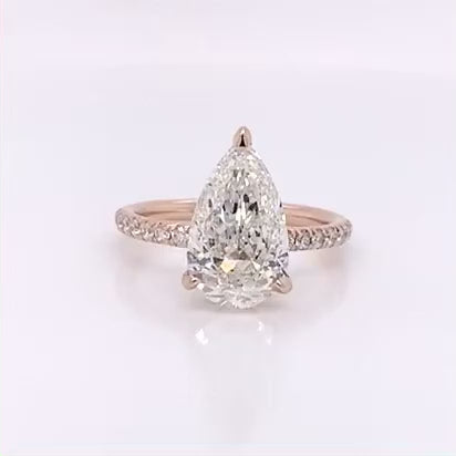 4 CT Pear Cut Lab Grown Diamond Hidden Halo Ring in Rose Gold