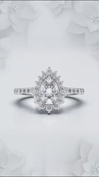 2 Carat Pear Cut Lab Grown Diamond Sunburst Floral Halo Engagement Ring in 14K White Gold