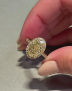 3 CT Fancy Yellow Oval Cut Lab Grown Diamond Halo Engagement Ring in 14K Yellow Gold.