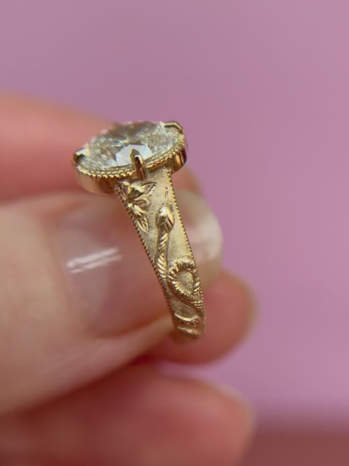 The Serpentine Flora: 3 Carat Oval Lab Diamond Milgrain Bezel Ring with Engraved Snake Motif