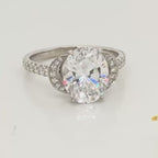 Elegant 3 CT Oval Cut Lab Created Diamond Ring with Curved Side Motifs